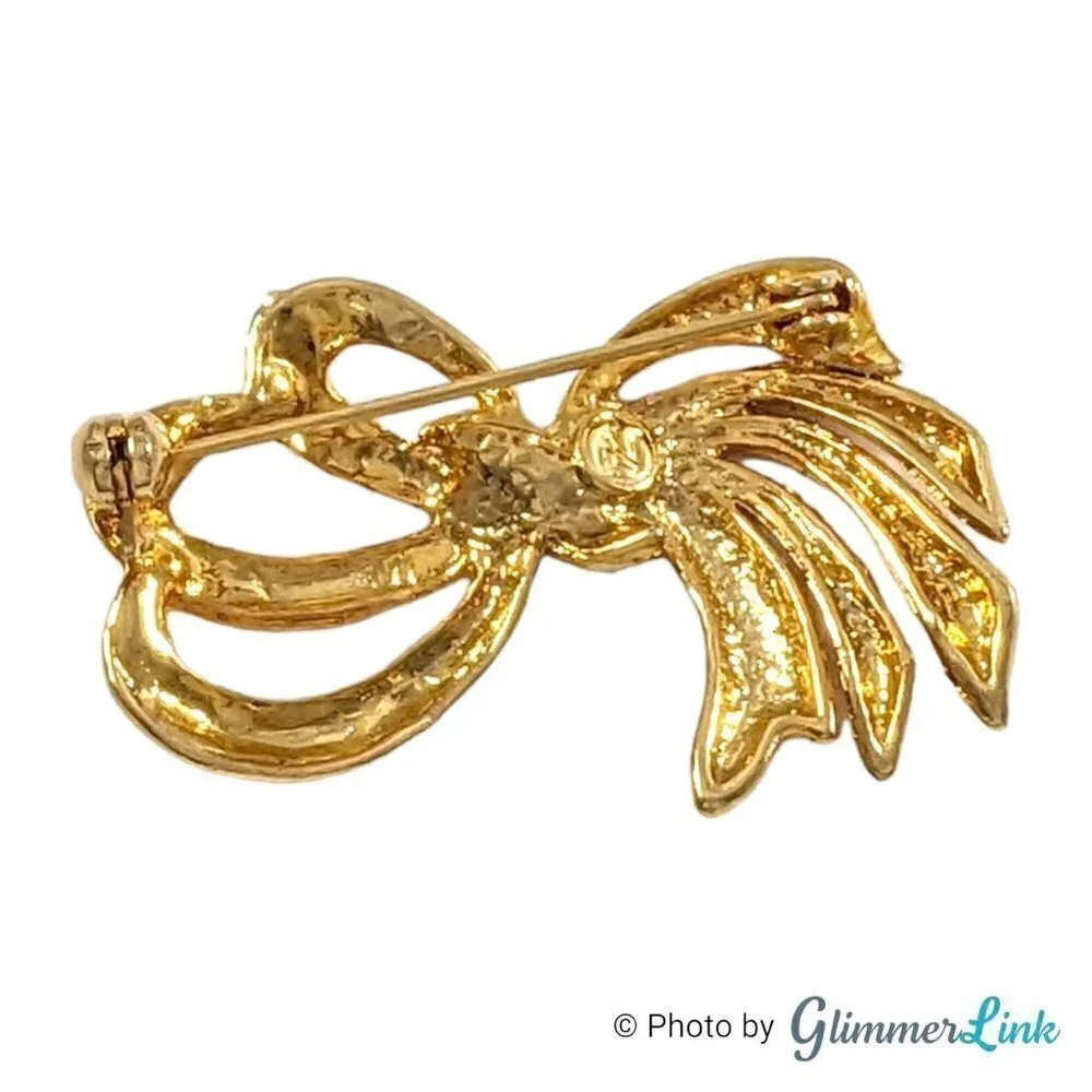 Vintage Gloria Vanderbilt Rhinestone Bow Brooch Gold Tone